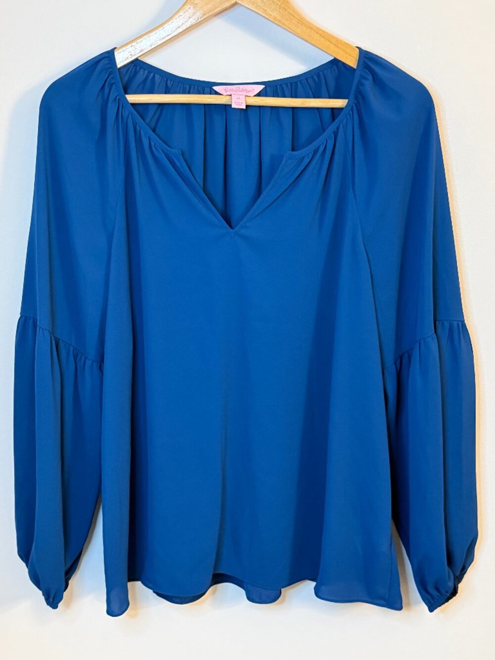 Lilly Pulitzer royal blue split-neck blouse with blouson sleeves